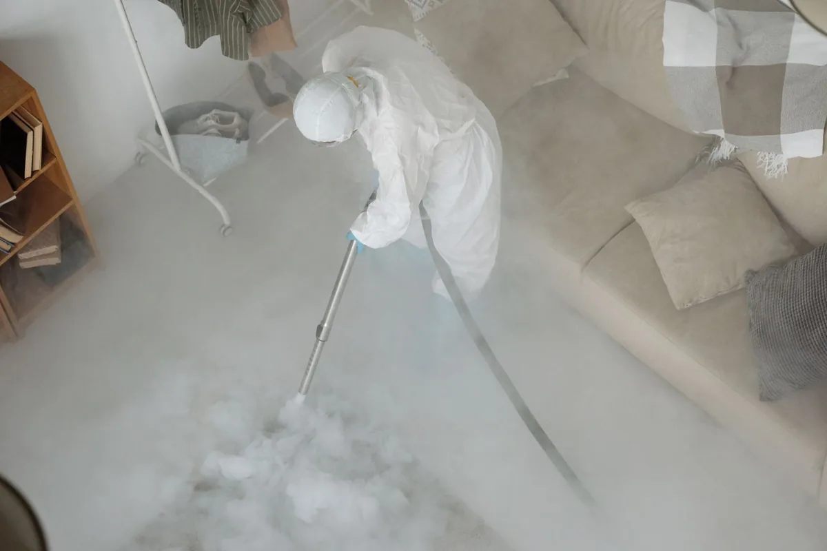 Biohazard cleanup technician in protective equipment, Mickleton, NJ